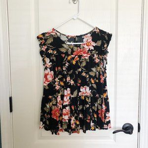 Floral sleeveless babydoll shirt.